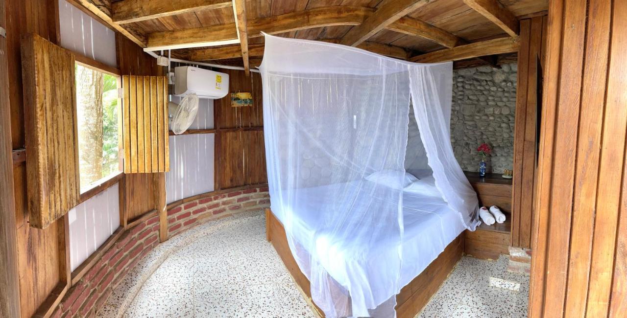Ecohostal Palmares Del Rio Guachaca Exterior photo